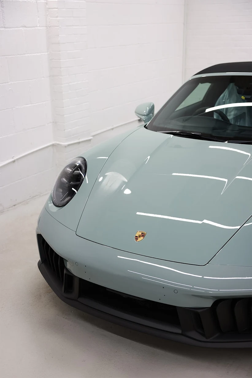 Self-healing paint protection film detail on the nose of a Porsche 911, RainCity PPF